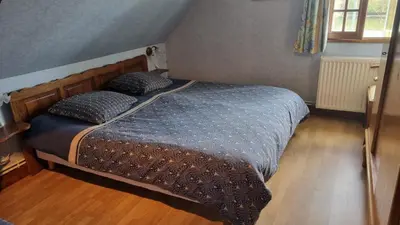 Un ou plusieurs lits dans un hébergement de l'établissement Appartement indépendant avec terrasse