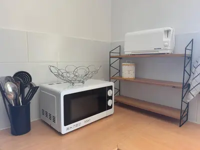 Cuisine ou kitchenette dans l'établissement La jocondie