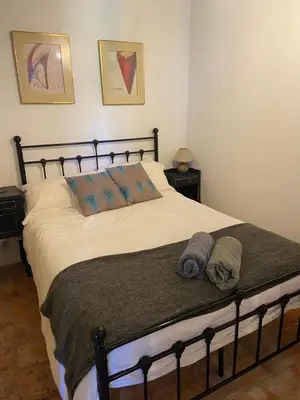 Un ou plusieurs lits dans un hébergement de l'établissement Sunflower Cottage