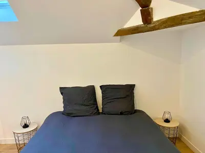 Un ou plusieurs lits dans un hébergement de l'établissement Beau Duplex moderne et calme - gare & centre - idéal pro-couple-famille