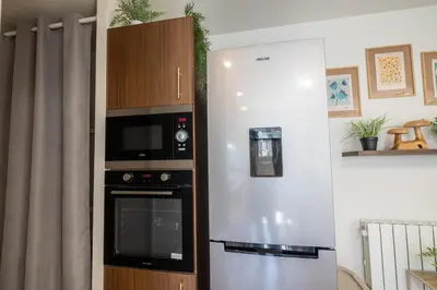 Cuisine ou kitchenette dans l'établissement L'Escapade Végétale - Centre Ville