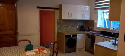 Cuisine ou kitchenette dans l'établissement Au coeur des vignes