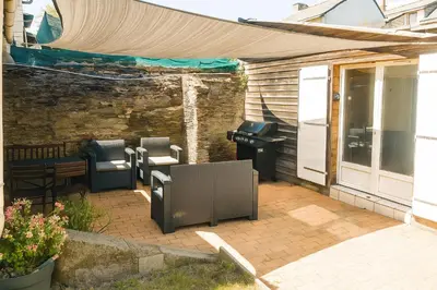 Coin salon dans l'établissement Lumineux T2, 2 pers, jardin & terrasse au calme