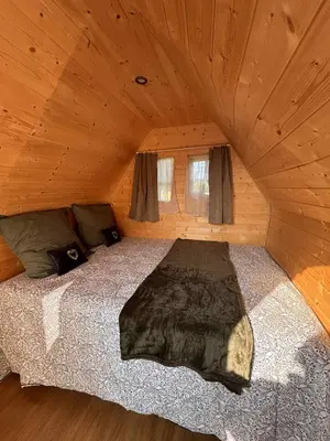Un ou plusieurs lits dans un hébergement de l'établissement La Cabane Mini Enchantée !