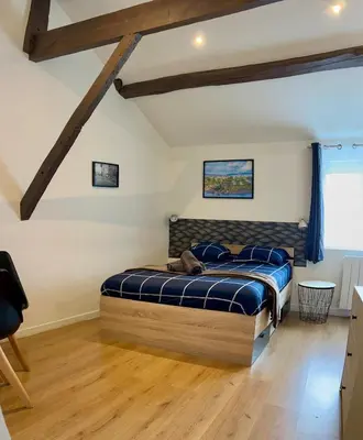 Un ou plusieurs lits dans un hébergement de l'établissement Studio Oslo-Charme & calme en Centre ville à pied avec parking gratuit