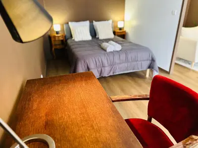 Un ou plusieurs lits dans un hébergement de l'établissement Appartement de la Gare