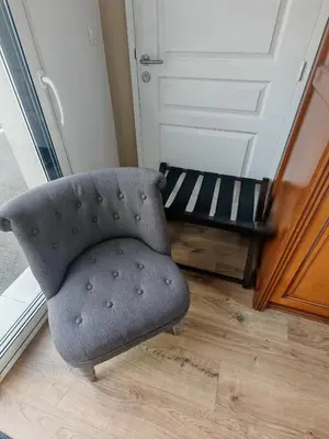 Coin salon dans l'établissement Suite avec parking 24h du mans