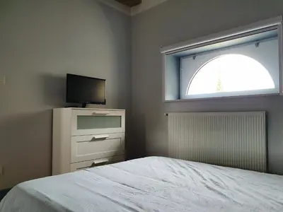 Télévision ou salle de divertissement dans l'établissement Tartigousse