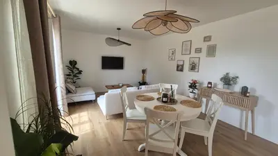 Télévision ou salle de divertissement dans l'établissement Gîte Au Cœur des Châteaux