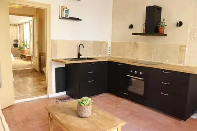 Cuisine ou kitchenette dans l'établissement Appartement au pied du château