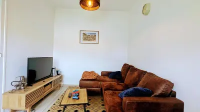 Télévision ou salle de divertissement dans l'établissement Trackside Loft 24h Le Mans Stay