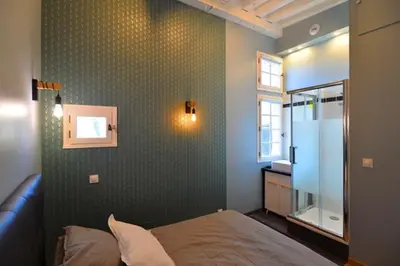 Un ou plusieurs lits dans un hébergement de l'établissement Appartement coeur de ville