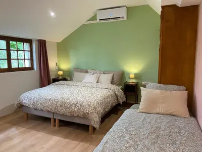 Un ou plusieurs lits dans un hébergement de l'établissement Domaine de la Closerie Champêtre - Chambres d'hôtes