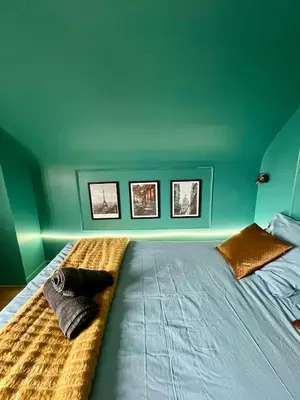 Un ou plusieurs lits dans un hébergement de l'établissement Studio Paris-Art déco lumineux & confort en plein centre