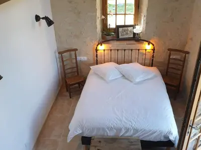 Un ou plusieurs lits dans un hébergement de l'établissement Maison d'hôtes près de La Flèche - Animaux Admis - Petit-déjeuner Inclus - FR-1-410-477