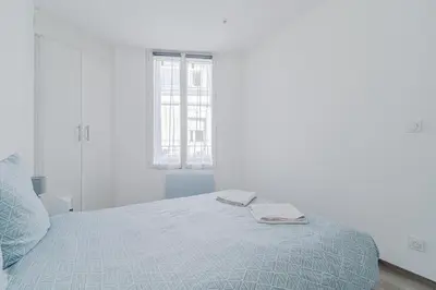 Un ou plusieurs lits dans un hébergement de l'établissement Séjour Cosy - Proche Gare & Centre - Futuroscope 3