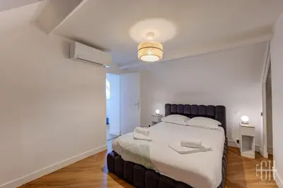 Un ou plusieurs lits dans un hébergement de l'établissement Villa Michelet - Jacuzzi - Sauna - Hyper Center