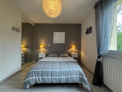 Un ou plusieurs lits dans un hébergement de l'établissement L'Orée du Bois - Piscine - 6pers - Garage