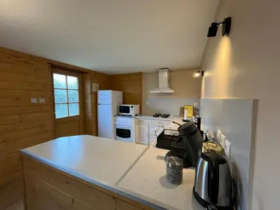 Cuisine ou kitchenette dans l'établissement Maison du Verger Idéal pour séjours pros