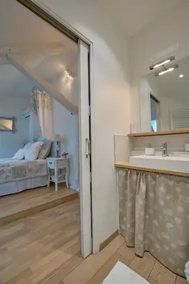 Un ou plusieurs lits dans un hébergement de l'établissement Chambres d'hôtes Le Theil