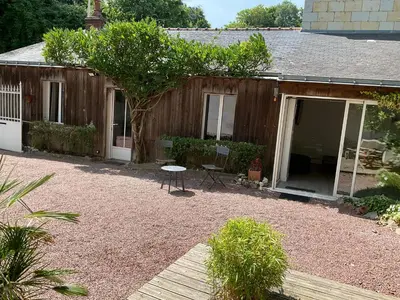 Jardin de l'établissement Charmante petite maison
