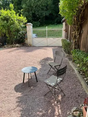 Jardin de l'établissement Charmante petite maison