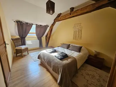 Un ou plusieurs lits dans un hébergement de l'établissement Gîtes du Château de Malcombe