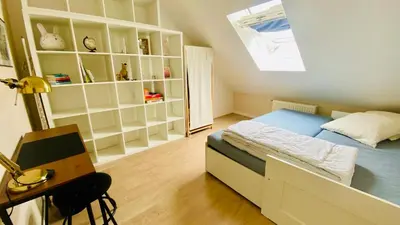 Un ou plusieurs lits dans un hébergement de l'établissement Le Duplex Franciade, centre-ville, parking, 2 chambres