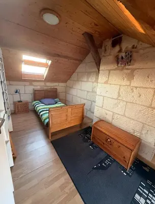 Un ou plusieurs lits dans un hébergement de l'établissement Maison Cosy Saumur