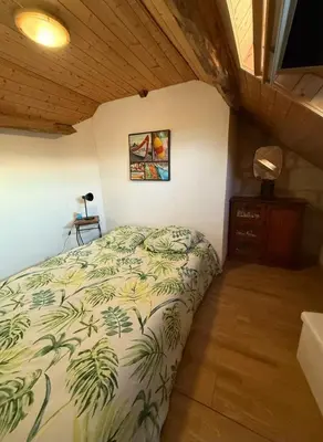 Un ou plusieurs lits dans un hébergement de l'établissement Maison Cosy Saumur