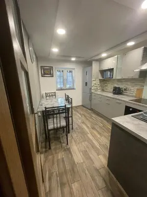 Cuisine ou kitchenette dans l'établissement Charmante Apartment