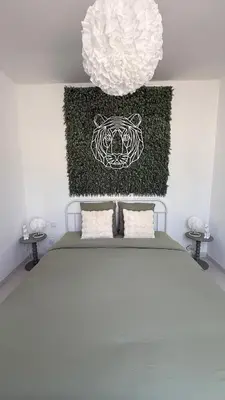 Un ou plusieurs lits dans un hébergement de l'établissement Gîte Relax'O'Zoo à 4min du Zoo
