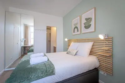 Un ou plusieurs lits dans un hébergement de l'établissement Maison L'Escale, proche des bords de Loire, 6 chambres avec sdb privée, jardin & terrasse