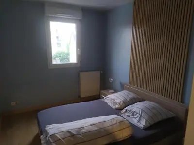 Un ou plusieurs lits dans un hébergement de l'établissement T3 COSY 2 chambres proche TOURS