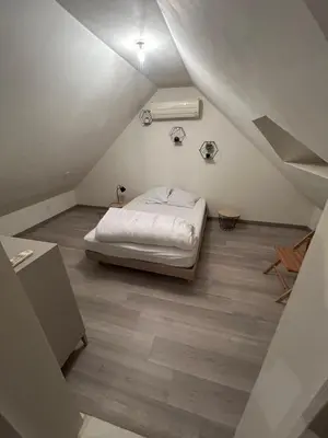 Un ou plusieurs lits dans un hébergement de l'établissement gite des châteaux