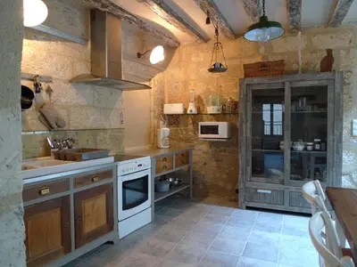 Cuisine ou kitchenette dans l'établissement Gite Nuance