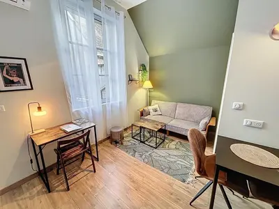Coin salon dans l'établissement Le Dolby - 2 appartements communiquants avec parking privé 4 couchages
