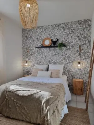 Un ou plusieurs lits dans un hébergement de l'établissement Maison cocon Bali