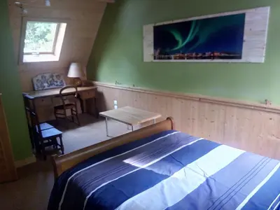 Un ou plusieurs lits dans un hébergement de l'établissement Maison Bois 