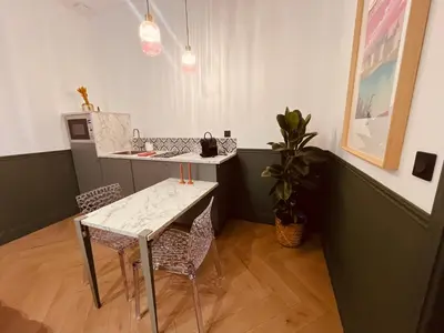 Cuisine ou kitchenette dans l'établissement Escapade Élégante