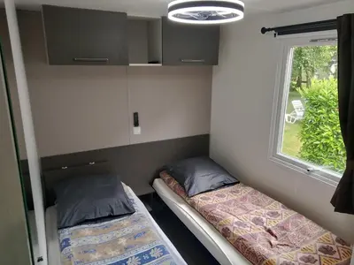 Un ou plusieurs lits dans un hébergement de l'établissement Domaine De Dugny