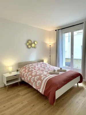 Un ou plusieurs lits dans un hébergement de l'établissement Le petit Parador