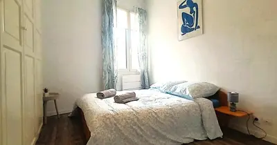 Un ou plusieurs lits dans un hébergement de l'établissement La Terrasse, T2 proche gare, Wifi, tv HD, grande terrasse