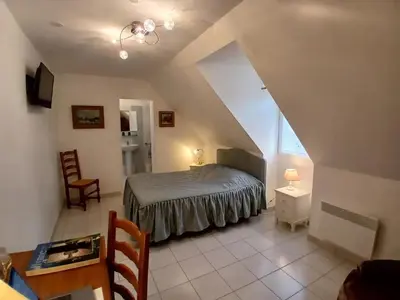 Un ou plusieurs lits dans un hébergement de l'établissement Chambres d'hôtes La Cabriole - Entre Amboise & Chenonceau