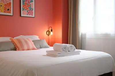 Un ou plusieurs lits dans un hébergement de l'établissement Appartement hyper centre - 6V - 2 Chambres - Wifi