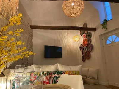 Télévision ou salle de divertissement dans l'établissement Halte Romantique