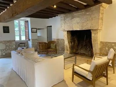 Coin salon dans l'établissement Le petit chateau