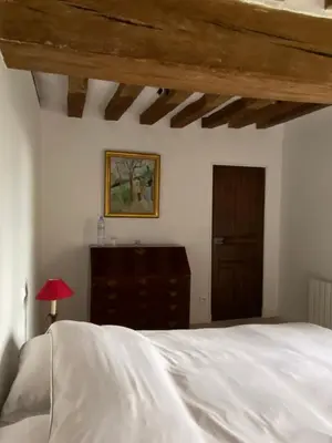 Un ou plusieurs lits dans un hébergement de l'établissement Le petit chateau
