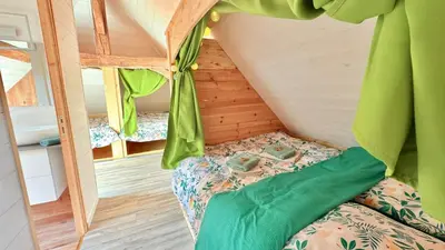 Un ou plusieurs lits dans un hébergement de l'établissement Gîte 