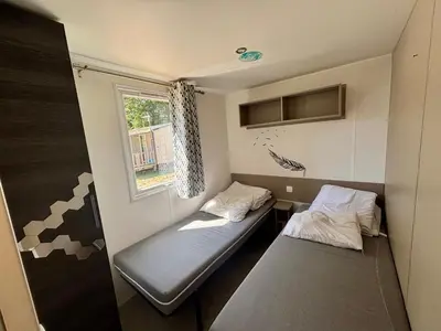 Un ou plusieurs lits dans un hébergement de l'établissement Mobil-home 4-6 personnes proche zoo de beauval